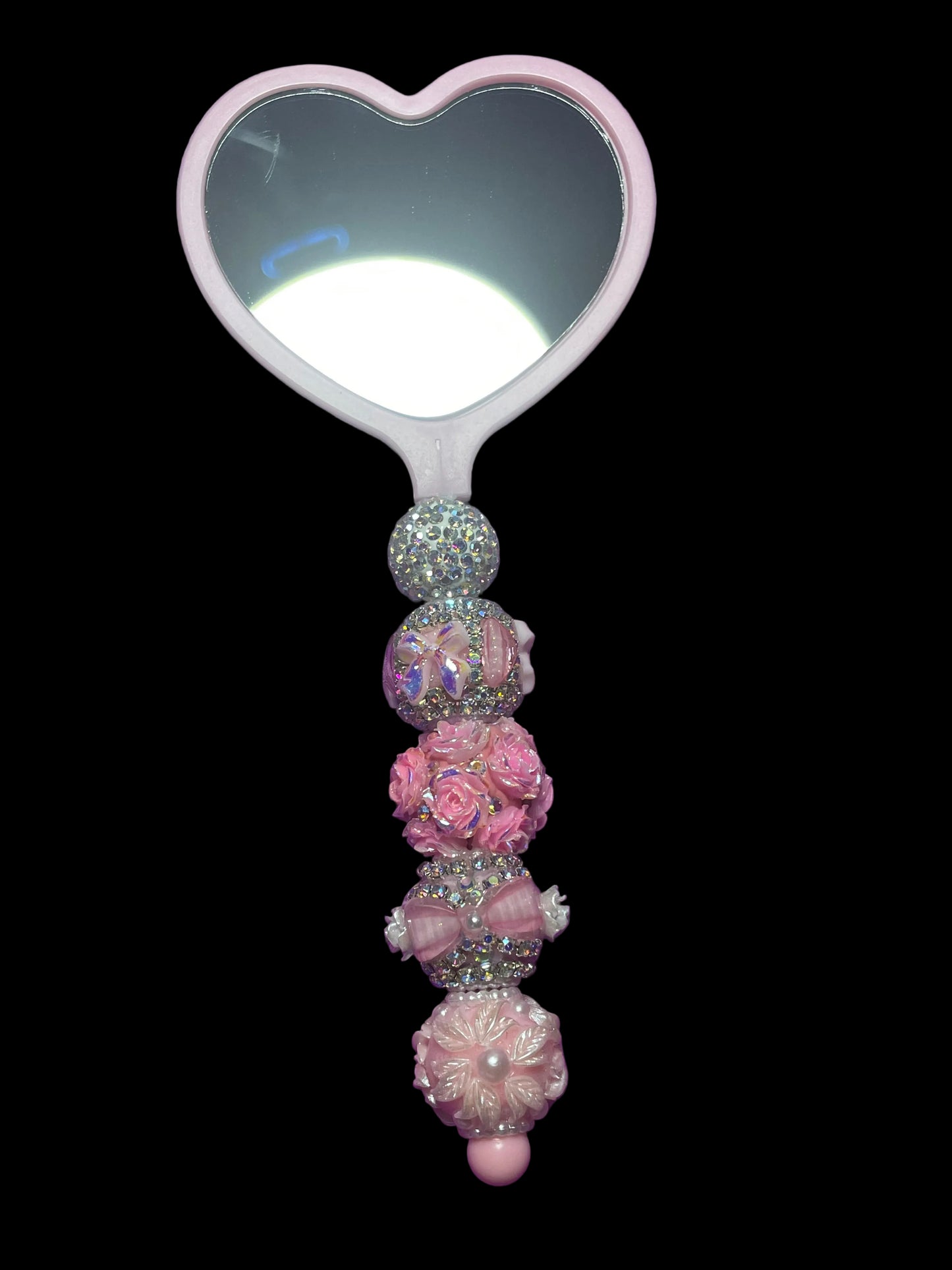 Hand held mirror