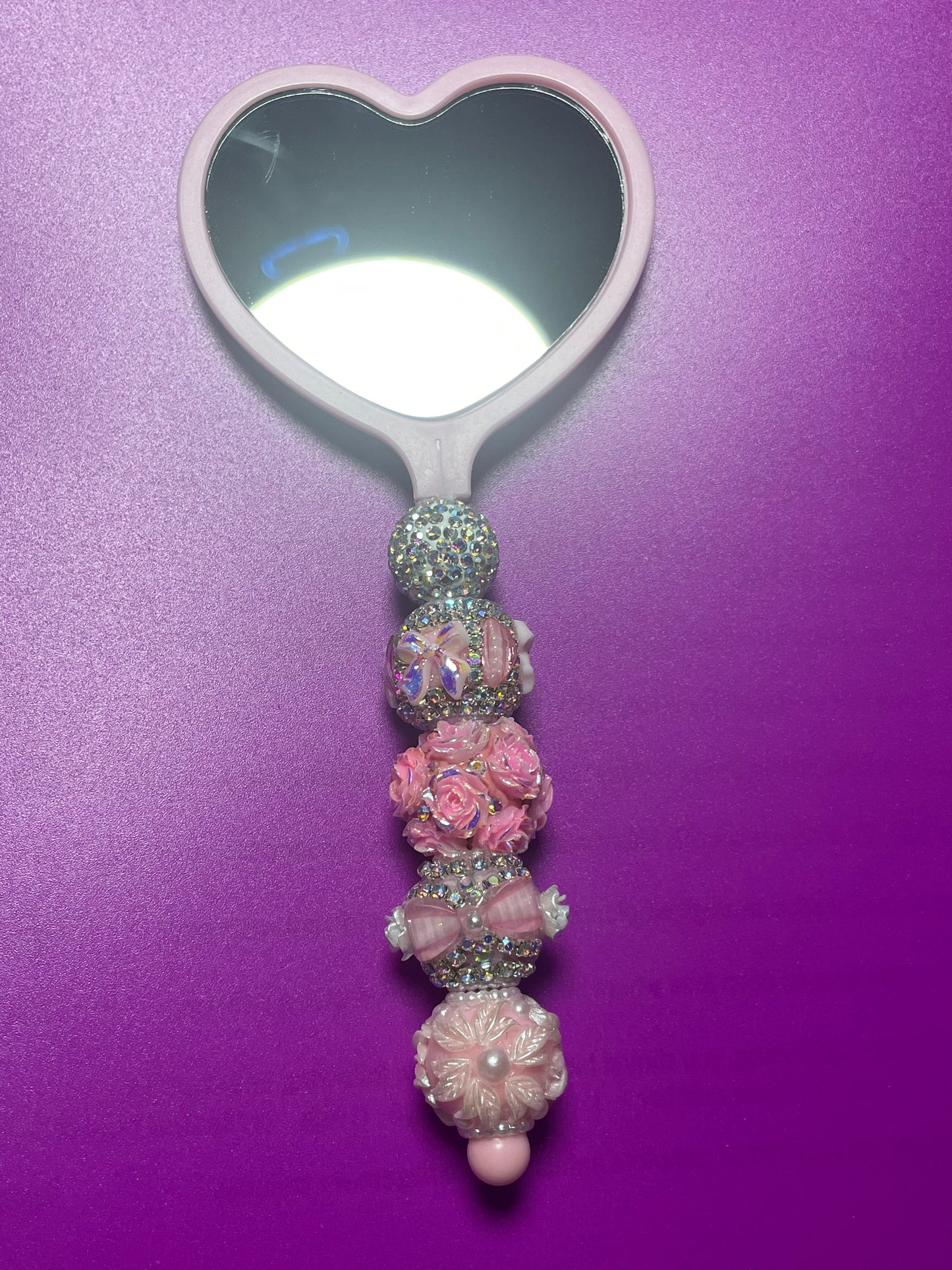 Hand held mirror