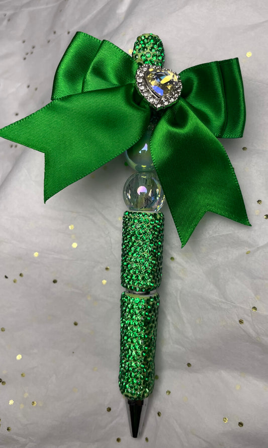 Bright Green Pen with Bow at the top and silver-ish Heart
